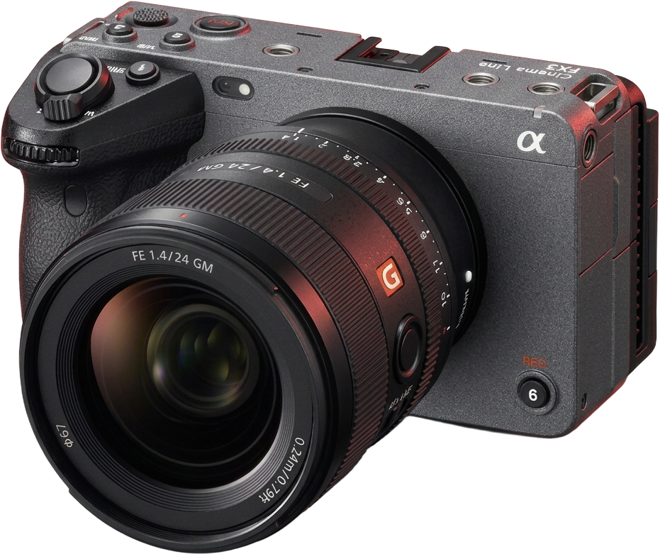 Cinema camera lit by a red studio light